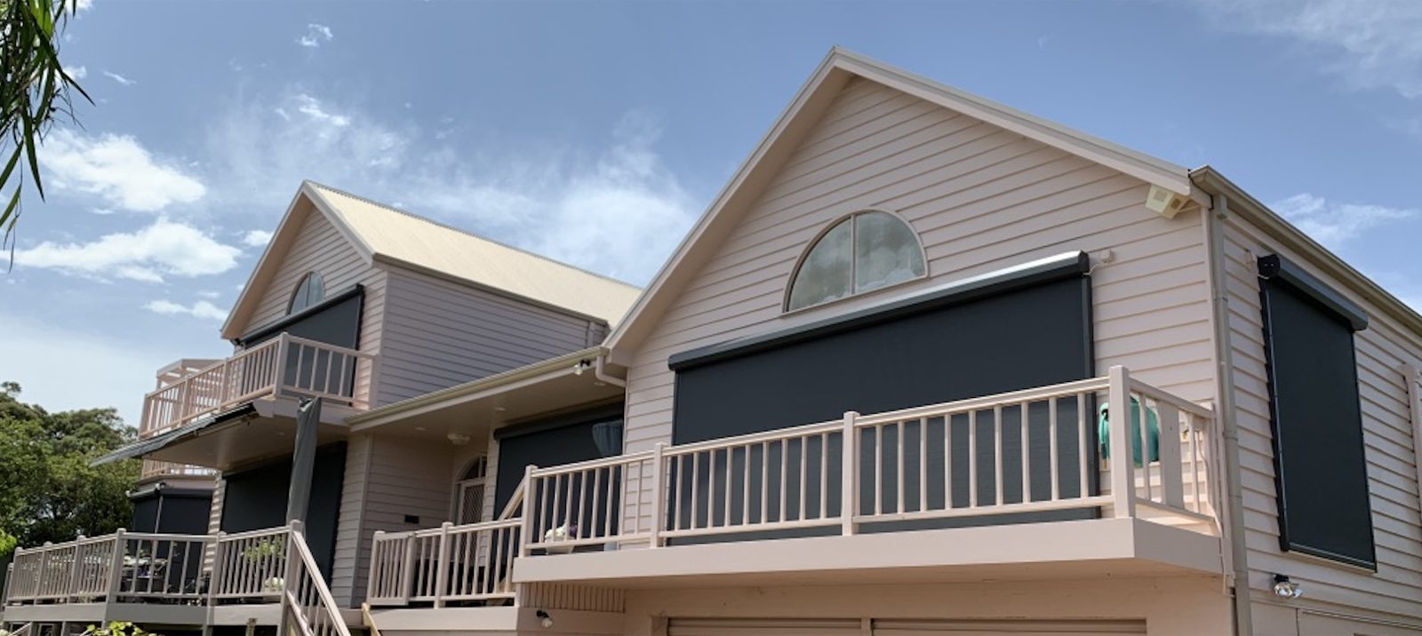 Motorised outdoor blinds installed on a modern Melbourne residential exterior