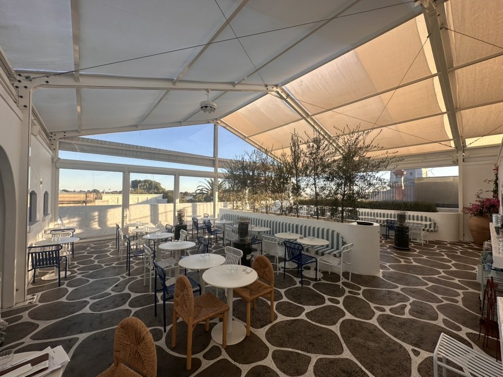 Olympia Restaurant rooftop dining area enclosed with Clear PVC and fixed panels