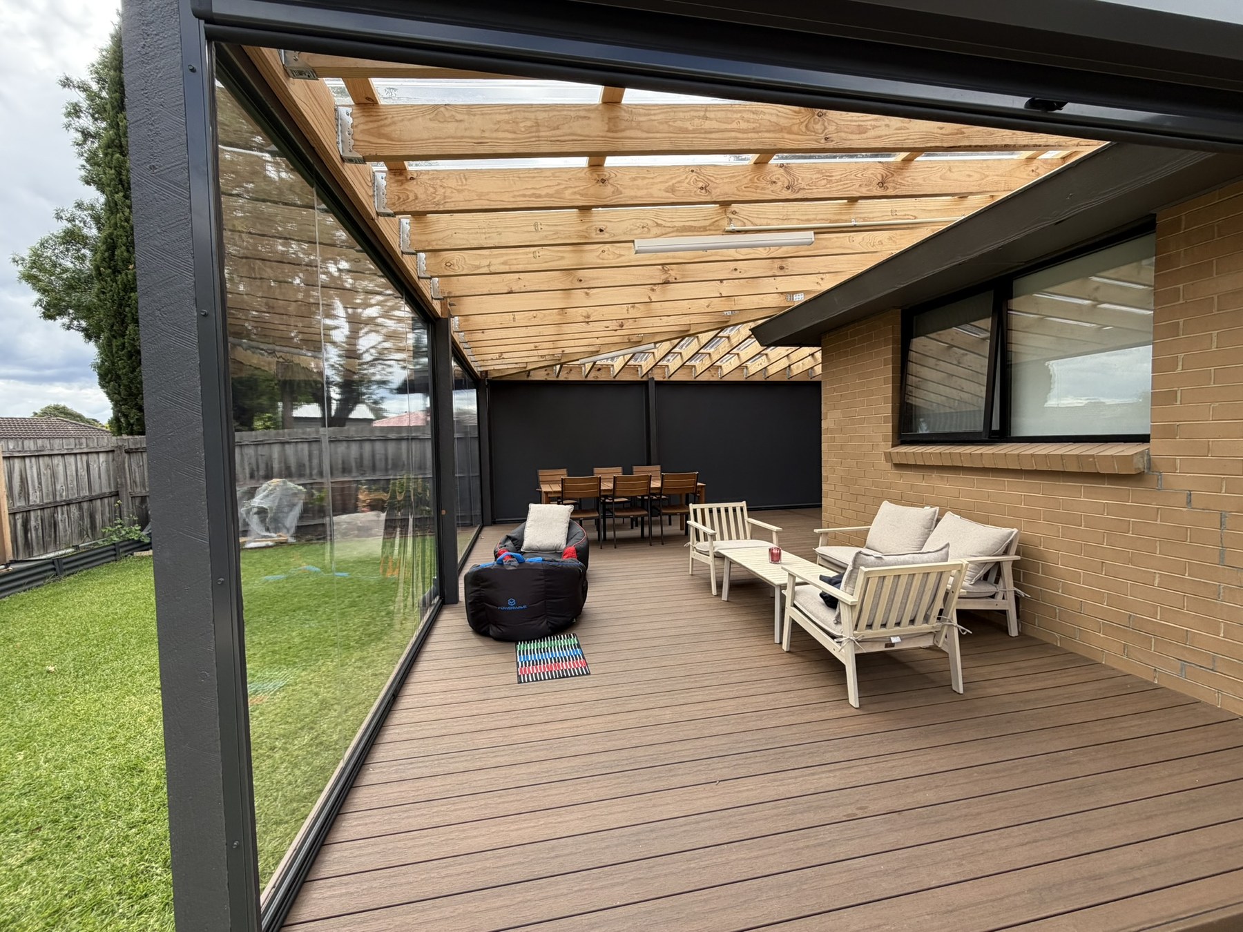 Clear PVC Ziptrak blinds around a Wantirna residential alfresco opening