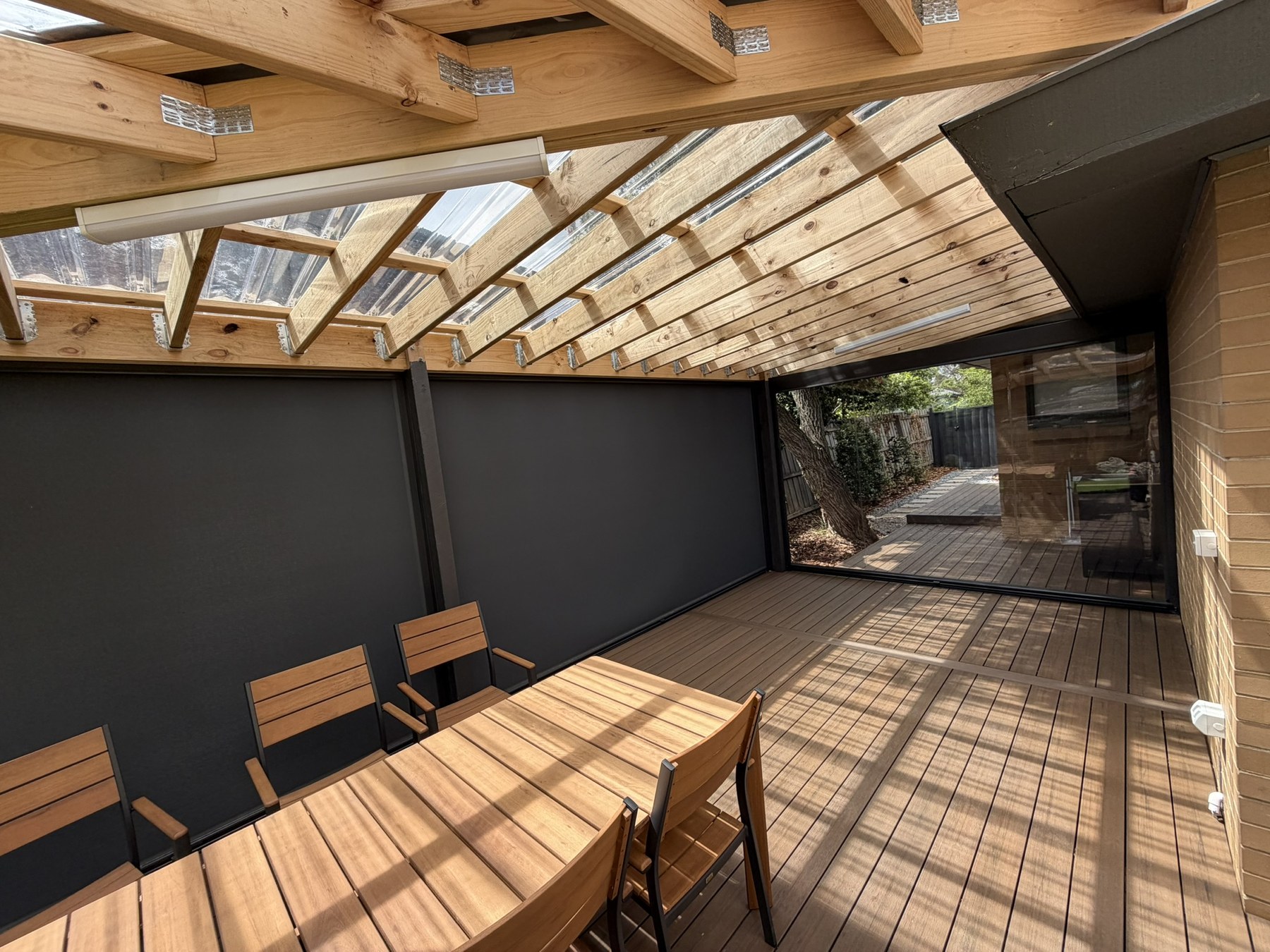 Wantirna alfresco area with clear PVC and blockout mesh Ziptrak blinds for privacy and weather protection