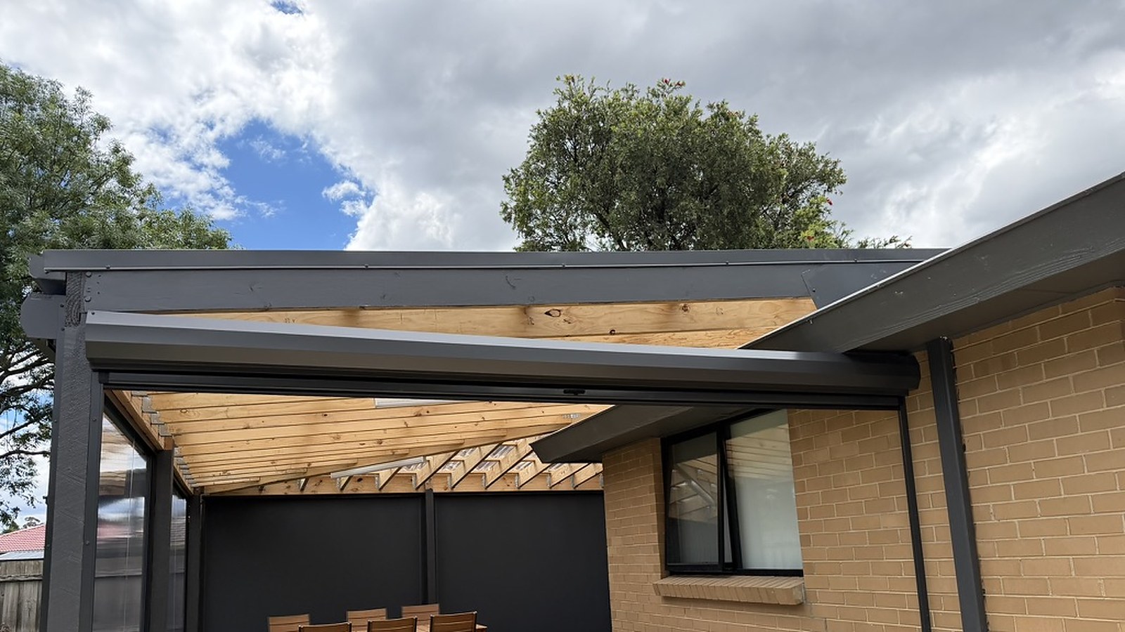 Wantirna Ziptrak blind top gap and custom flashing detail above the alfresco opening