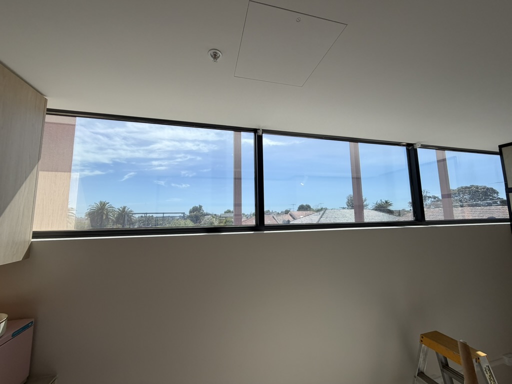Long interior window before blinds are lowered
