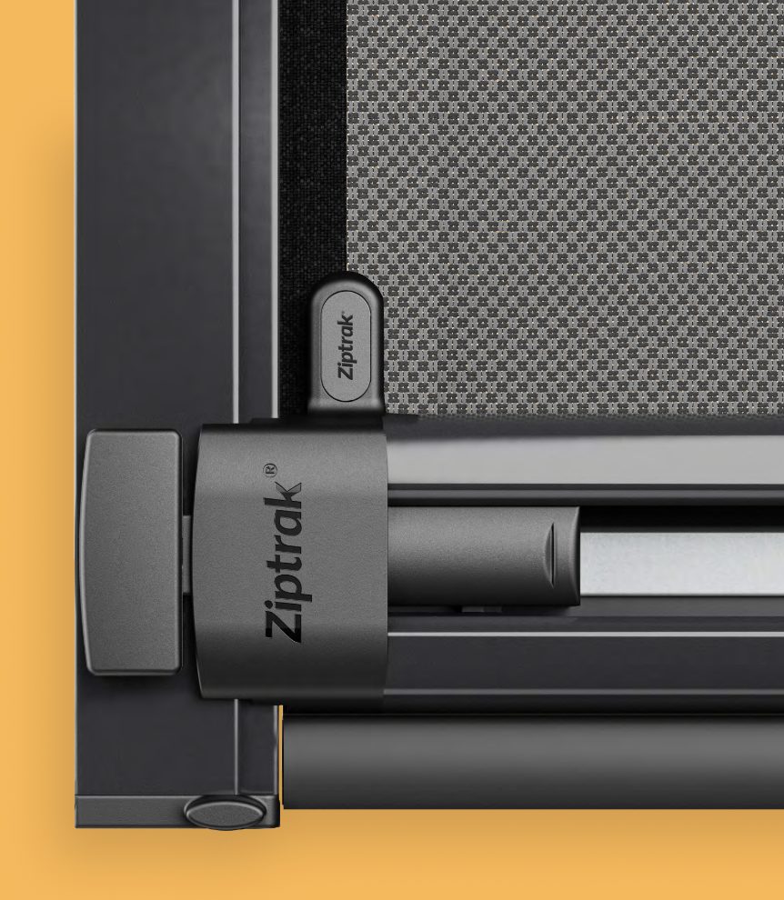 Close-up of a genuine Ziptrak bottom bar, side channel and fabric component